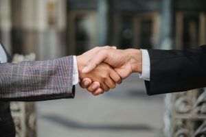 Two people shaking hands