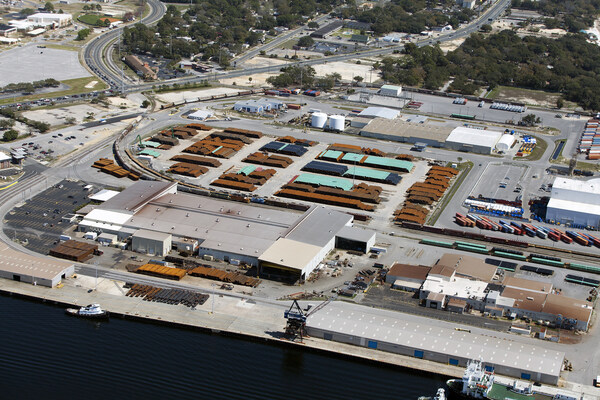 An aerial view Borusan Pipe, showing a large production facility, surrounded by short rail lines and piles of steel pipe